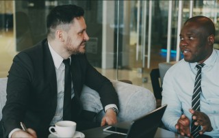 Small business owners reviewing scheduling and intake workflow
